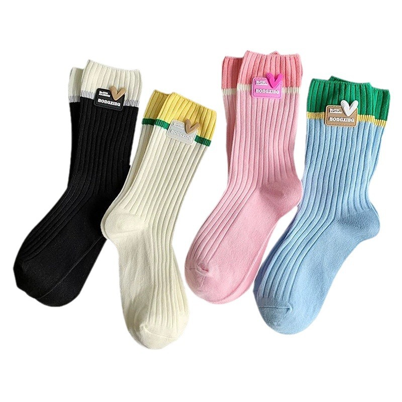 Calcetines de algodón de color puro calcetines de mujer de otoño e invierno a media pantorrilla calcetines de dopamina desgaste ins moda doble aguja amor Rosa pila Calcetines