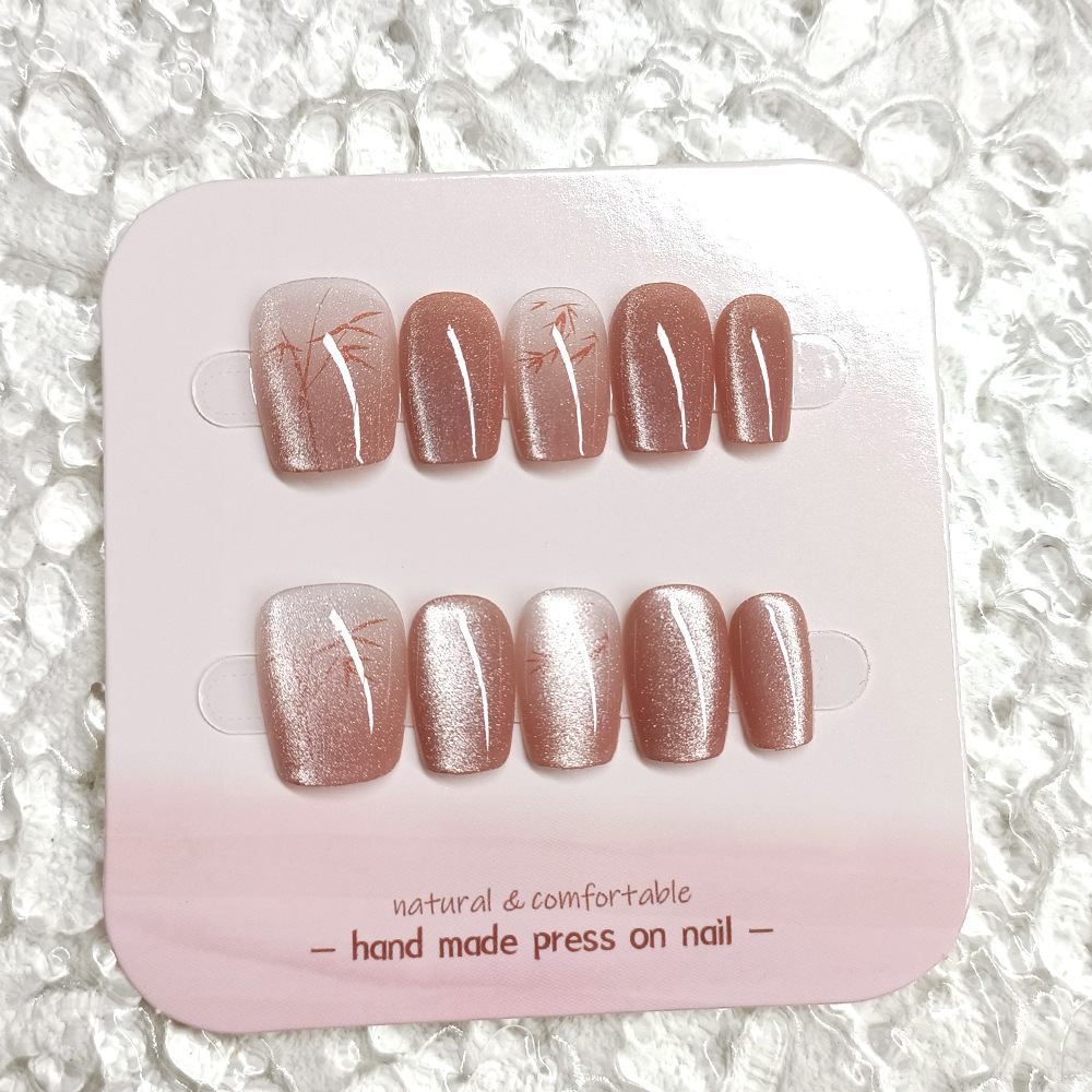 Nuevas puntas de uñas hechas a mano de estilo chino, juego de diez piezas de cristal ojo de gato para decoración de uñas, pegatinas cortas de bambú rojo ojo de gato para uñas.