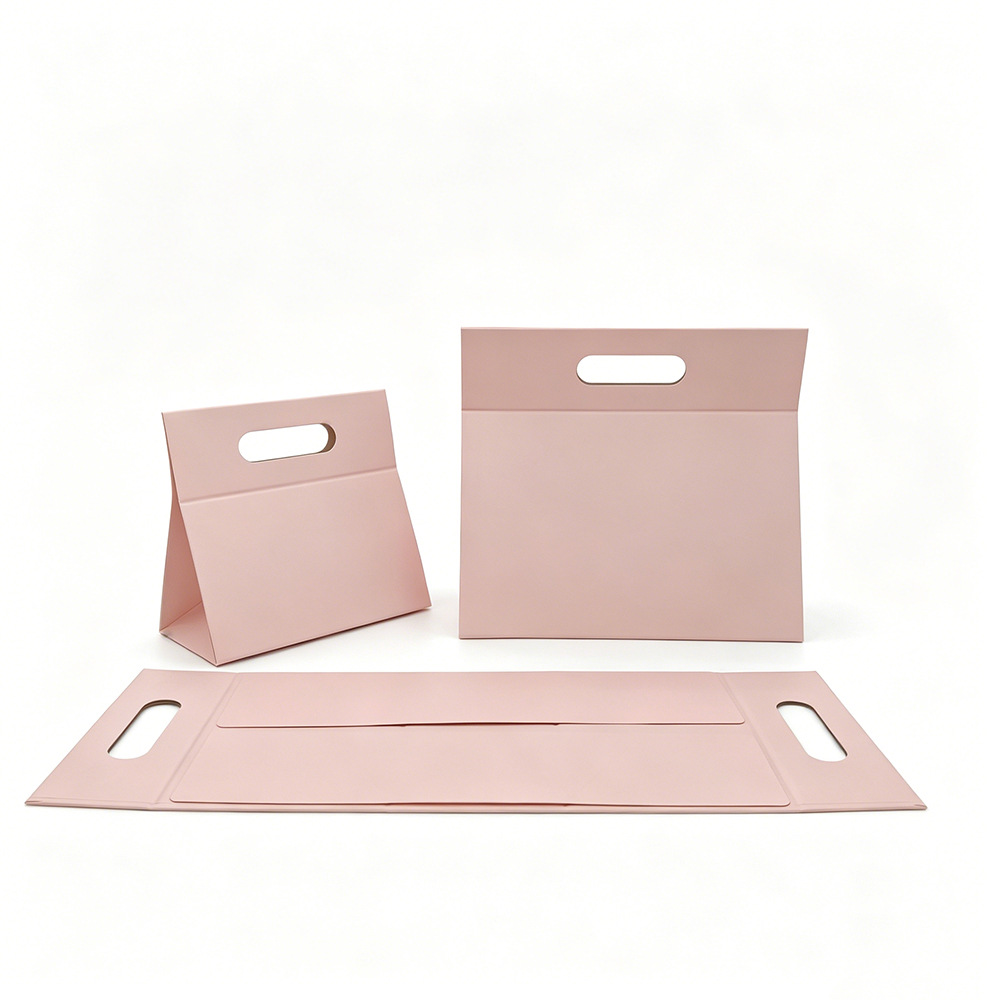 Caja plegable triangular - rosa; tamaño pequeño 20x10x20cm