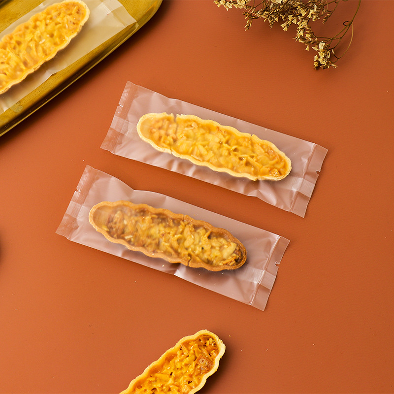 Clásico tipo barco de arroz glutinoso embalaje rectangular máquina de hornear bolsa de sellado en stock fábrica al por mayor bolsa de embalaje de piruletas