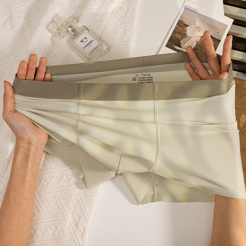 Nueva ropa interior de hombre sin costuras de seda de hielo waffle, ropa interior de entrepierna transpirable cómoda, pantalones cuadrangulares agradables para la piel de cintura media para hombre