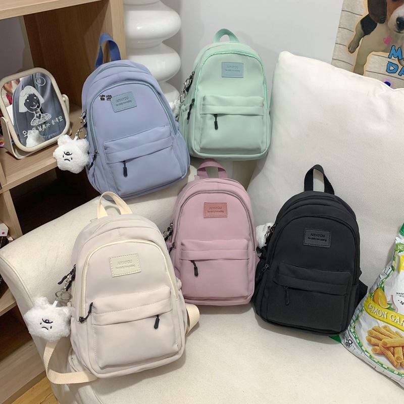 纯色双肩包女0新款中学生少女小容量高中书包大学女生简约背包 纯色双肩包女0新款中学生少女小容量高中书包大学女生简约背包