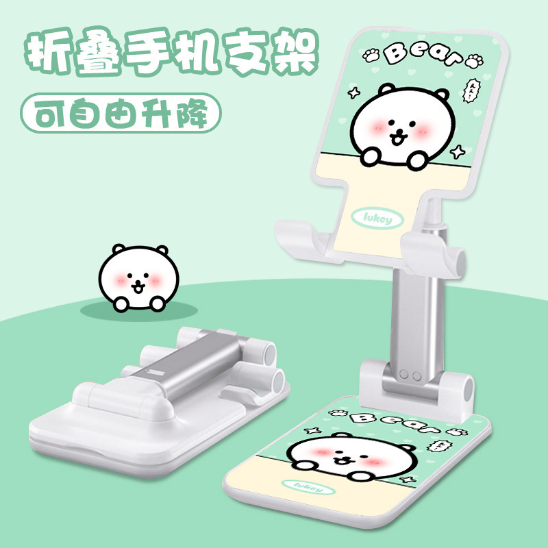 Kt猫の漫画の携帯電話の支柱はタブレットの怠け者のデスクトップの新型の生放送のネット課の神器のベッドの頭の折り畳みの支柱を適用します。|undefined