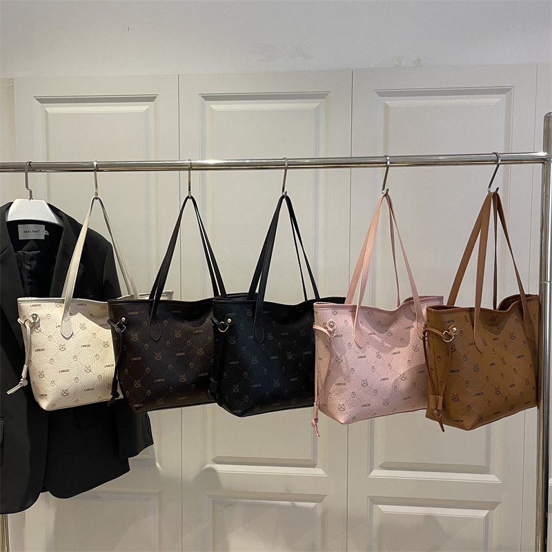 Bolso de mano transfronterizo coreano bolso de mujer otoño 2025 nuevo bolso de hombro de lujo ligero de textura alta bolso de brazo