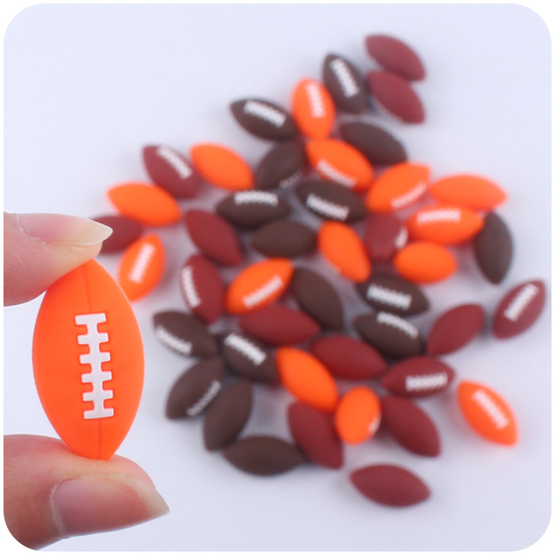 Creativo DIY suministros de bebé de dibujos animados de silicona rugby mordedura de bebé mordedura molar cadena de chupete accesorios