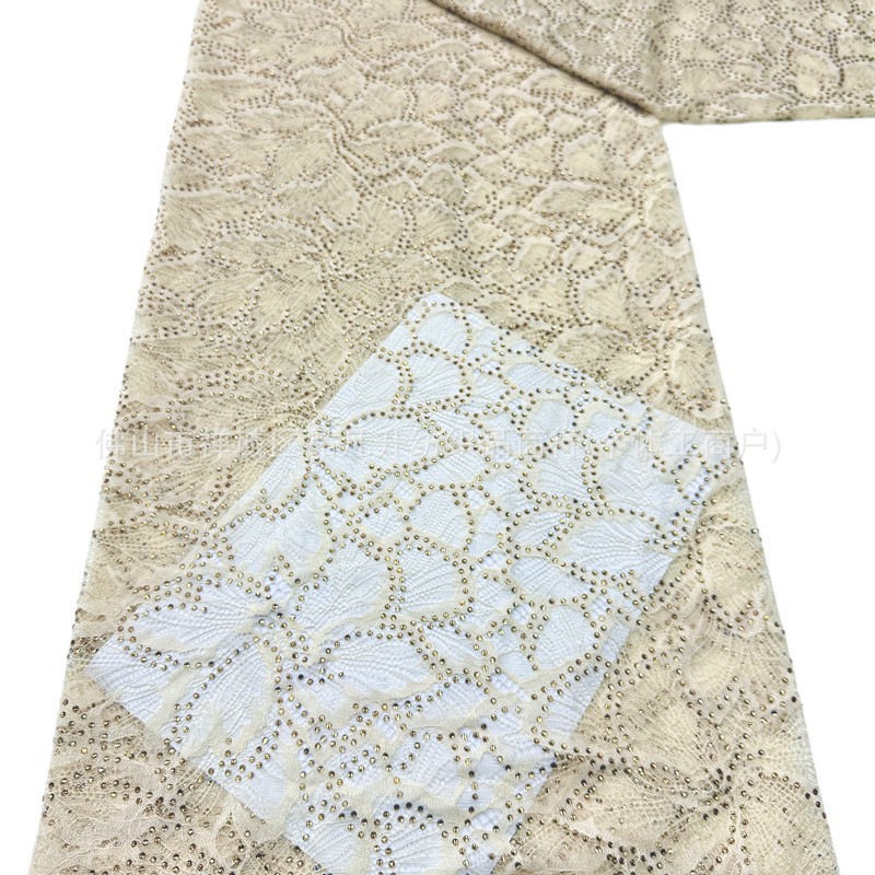 Nuevo hueco flor de encaje fondo tela de perforación caliente pesada cola de pez vestido de boda vestido de noche brindis tela spot