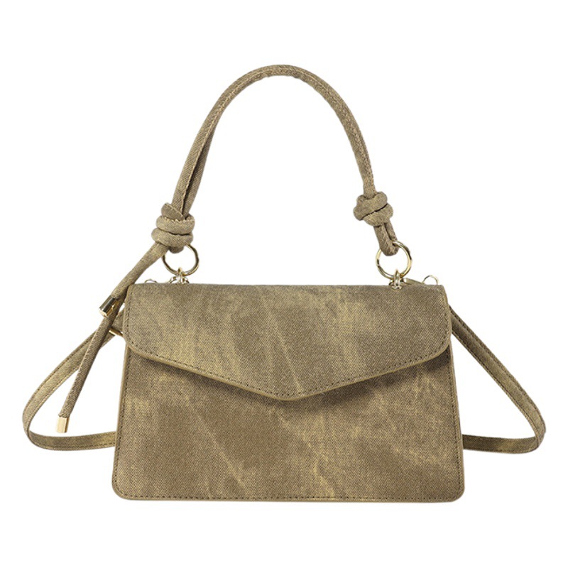 Neto rojo Joker tendencia de color sólido bolso simple bolso de las mujeres 2024 Invierno nuevo bolso cuadrado pequeño oblicuo Cruz Portátil Bolsa de costura del coche