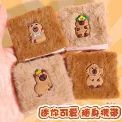 カピバラのぬいぐるみの携帯帳簿のノートのミニは本のかわいい豆の本のポケットを分かち合います。