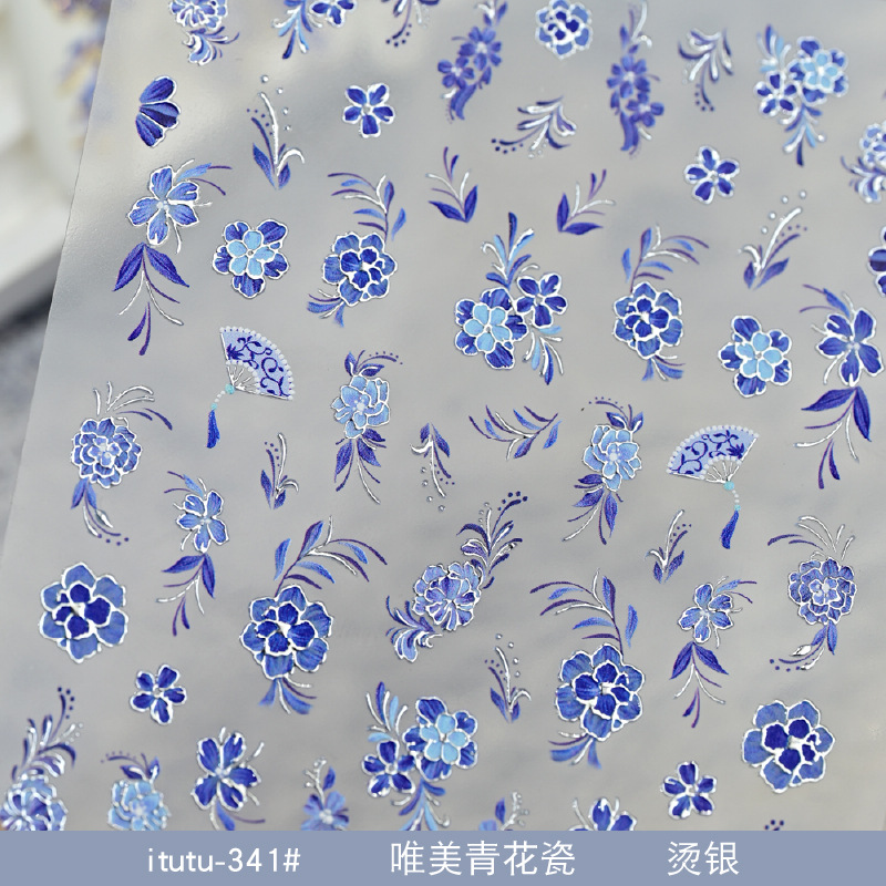 Red de celebridades de la red nuevo estilo nacional hermoso Qinghua porcelana bronceado pegatinas de uñas en caliente en relieve flores tridimensionales pegatinas de uñas plateadas en caliente al por mayor