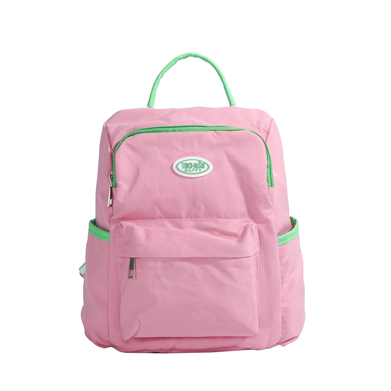 Mochila casual y sencilla para niños y niñas, estilo occidental, lindo color caramelo, mochila escolar para estudiantes de escuela primaria, nueva mochila para niños transfronteriza
