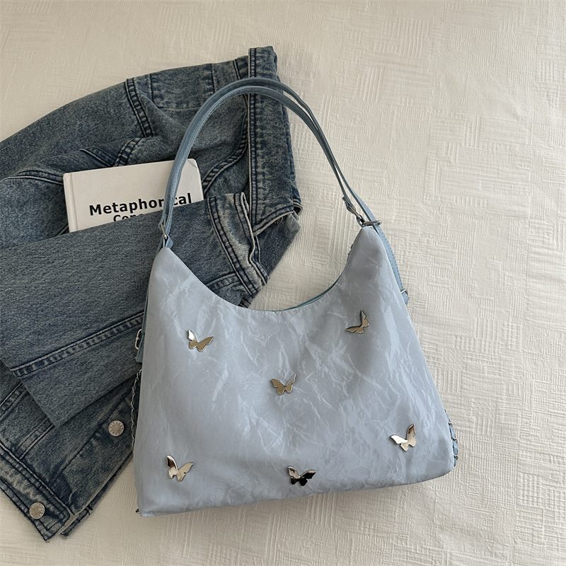 Mochila de viajes de gran capacidad para mujeres 2024 nueva moda mariposa brazo bolso de hombro bolso de cadena universal