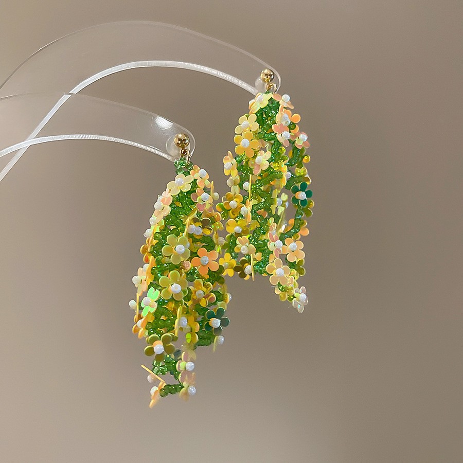 Pendientes de borla de flores de tela de aguja de plata Pendientes de estilo de vacaciones junto al mar