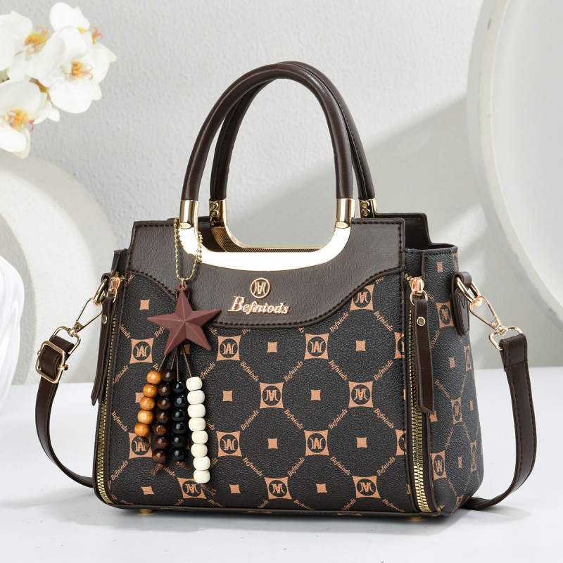 Bolsas de mano de moda casuales con estrellas colgantes, bolsas de hombro, bolsas de transporte aéreo, bolsas de mujer transfronterizas