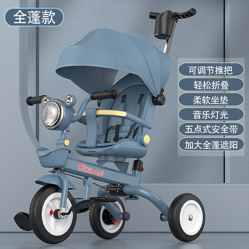Spot al por mayor triciclo para niños multifunción plegable para bebés y niños pequeños pueden sentarse y acostarse música cochecito bicicleta