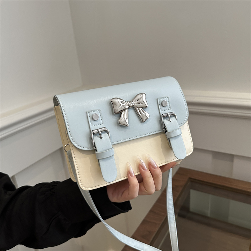 Temperamento bolso de arco para mujeres 2024 primavera nuevo estilo versátil en un hombro mochila popular este año bolso cuadrado
