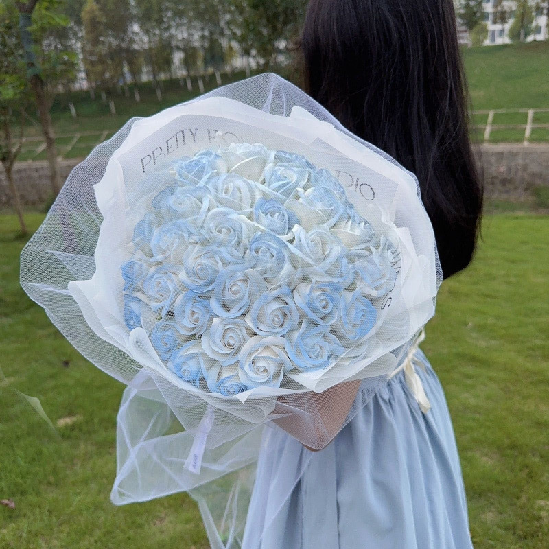 33 crushed blue roses + romantic string lights