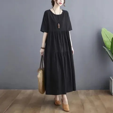Summer fashion, artistic design for plus-size women: Large-size cotton-linen short-sleeve dress with paneling—perfect for hiding belly area, creating a slimming effect, and offering a relaxed, flowy silhouette.