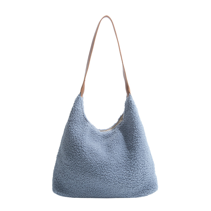 Retro de peluche de gran capacidad 2024 nuevo otoño e invierno estilo de viaje bolso de hombro minimalista estilo bolso de moda