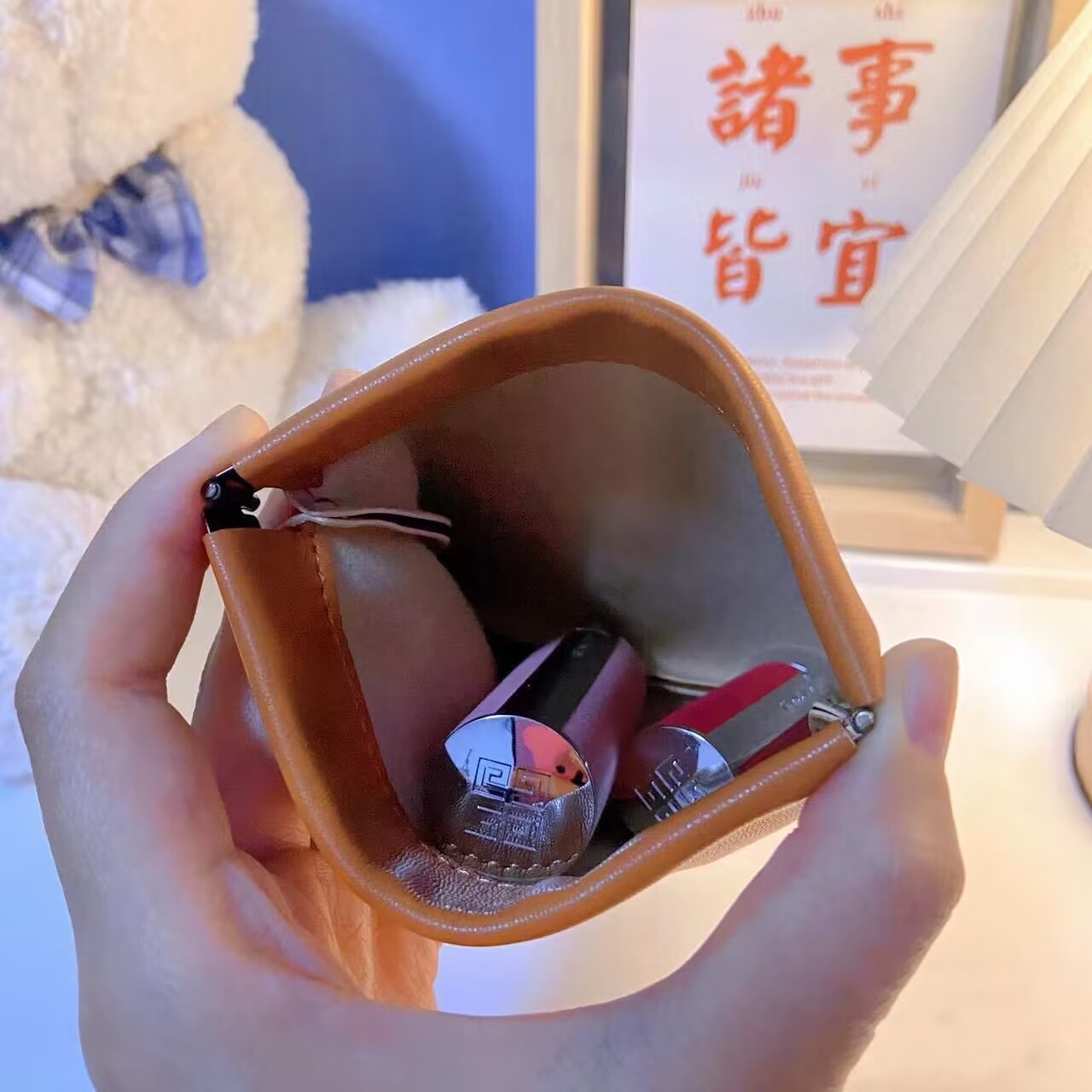 Fábrica al por mayor pieza de primavera pu auricular automático boca apretada bolsa de almacenamiento inalámbrico auricular cable de datos Portátil Bolsa de metralla