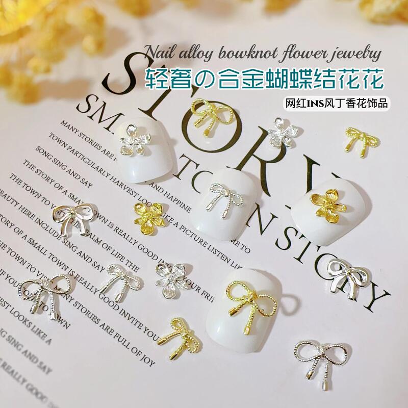 Internet Celebrity Alloy Bow Nail Art Jewelry Japanese Style Ins Style Lilac Flower Light Luxury Five Flowers Hollow Nail Decoration Internet Celebrity Alloy Bow Nail Art Jewelry Japanese Style Ins Style Lilac Flower Light Luxury Five Flowers Hollow Nail Decoration