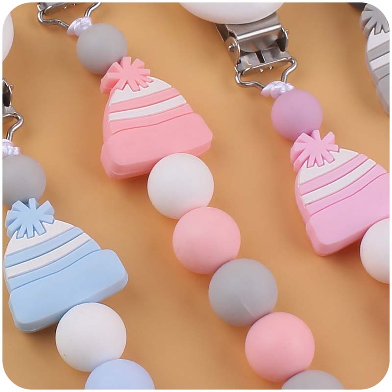 Nuevo bebé suministros chupete cadena bebé creativo de dibujos animados sombrero de Navidad silicona mordida pegamento anti-gota cadena