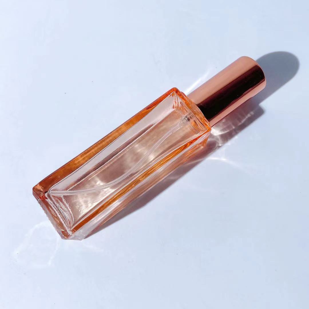 Muestra de perfume sub-botella de alta gama botella de aerosol portátil 10ml de vidrio avanzado sub-contenedor 5ml mini botella vacía