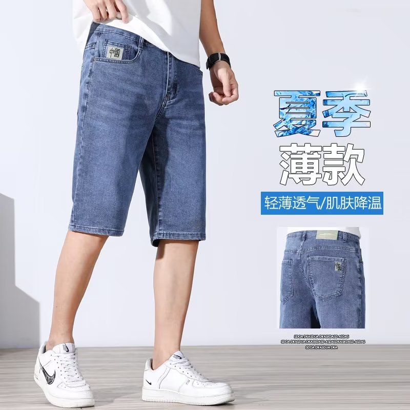 Pantalones de cinco puntos casuales elásticos de verano fino de los hombres de moda de mezclilla 2023