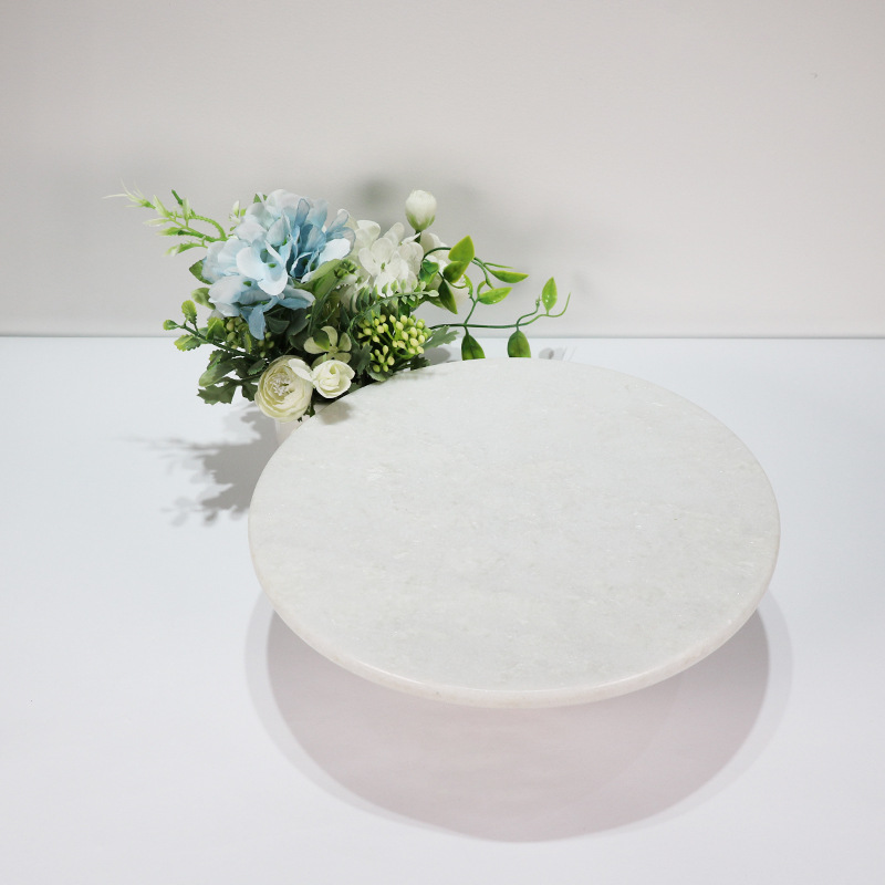 ���ư�ɫ����ʯ����ˮ�������������̼�Լ�Ҿ����ݴ���ʯ�߲���