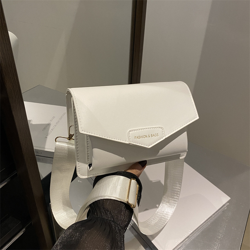 Calle casualidad de color sólido bolso de hombro 2024 nuevo tipo de bolso de mano casualidad nueva moda simple bolso de hombro