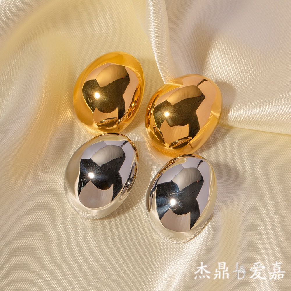 El acero inoxidable de los pendientes populares del nicho simple de la personalidad de la moda europea y americana plateó los pendientes en forma de haba redondos brillantes exagerados 18K para las mujeres
