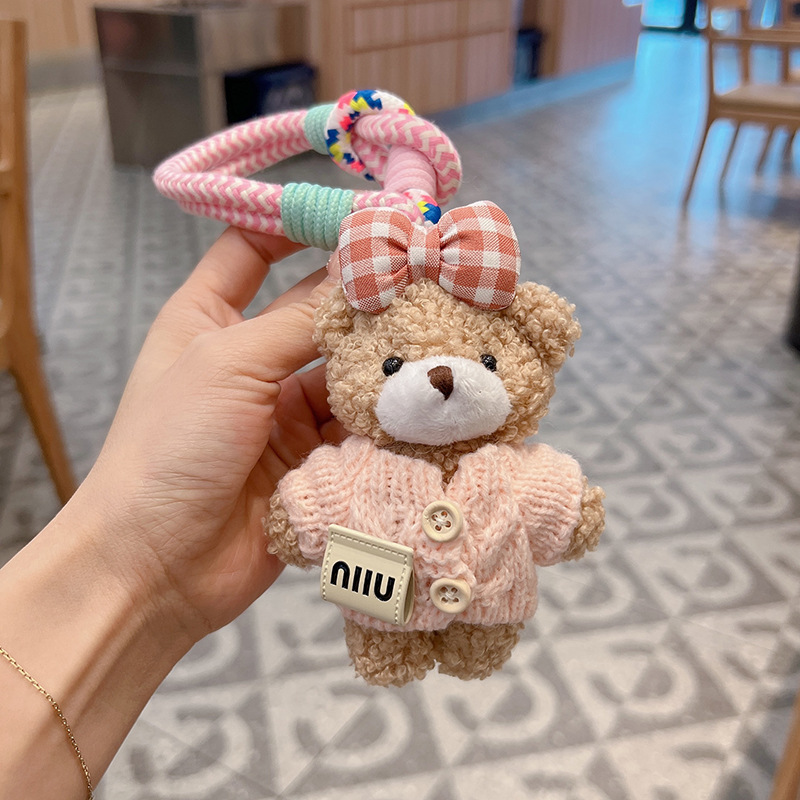 新商品のアニメの蝶結びのセーターの熊の車のキーホルダーのアイデアのぬいぐるみのカバンの装飾の女性