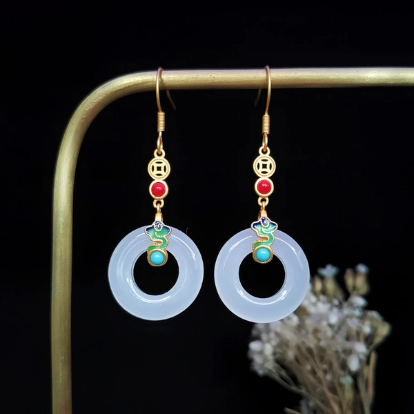 Protective amulet, buckle, earrings