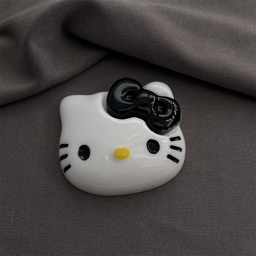 큰 검은 활 넥타이 고양이 머리