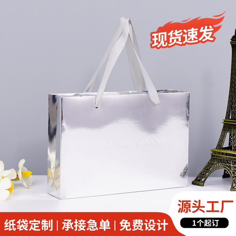 White Cardboard Bag in stock Premium Sense silver Mirror Perforated Clothing Store Handbag Custom Ins Style Silver Card Hot Log