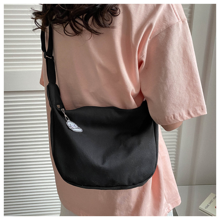 Large capacity canvas shoulder for women in spring summer 2023, new solid color, simple and fashionable casual bag,_voghion.com