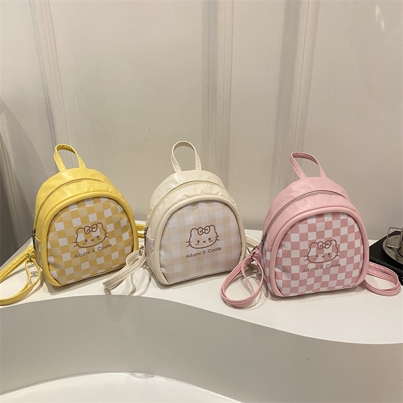 Personalidad extranjera de estilo universal, mochila de hombro para niñas, nuevo diseño de patrón de cuadrillas, mochila diaria image 5