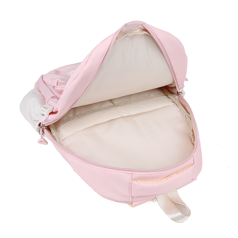 2025 nueva mochila de dibujos animados de escuela secundaria y secundaria mochila de estudiantes de escuela primaria y secundaria de gran capacidad mochila de viaje al aire libre