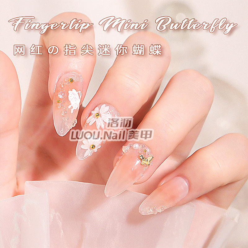 Nueva mariposa japonesa joyería de uñas en línea celebridad aleación tridimensional mariposa de una pieza mini mariposa hueca decoración de uñas