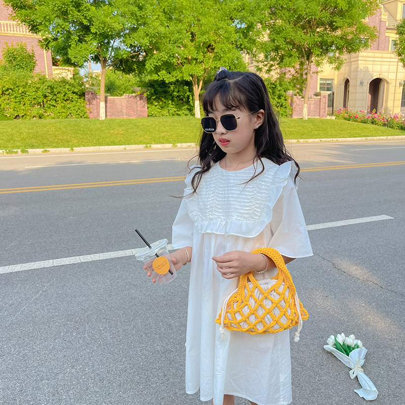 Bolsa de red de pesca para niños de estilo coreano 2022 otoño nuevo comercio exterior bolsa tejida personalizada niños y niñas bolsa de cubo hueco portátil