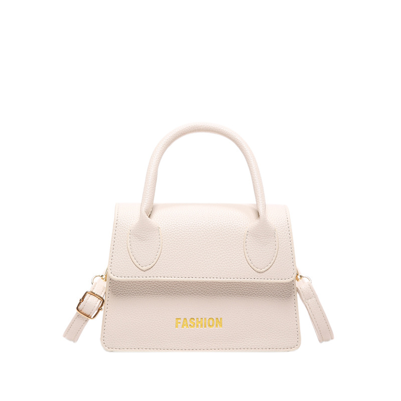 Europa y los Estados Unidos letras de moda bolsos de mano 2024 nuevo lichi estilo retro bolsos de hombro texturizados bolsos de mujer