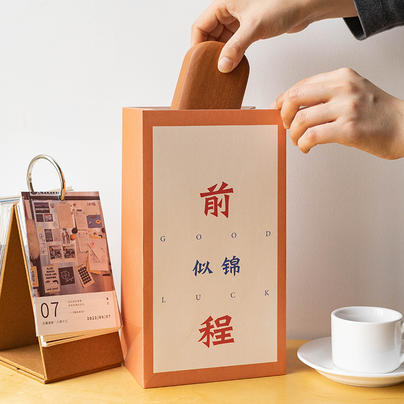 创意表情卡通礼品袋圣诞春节礼物纸袋子小清新厚包装牛皮纸手提袋