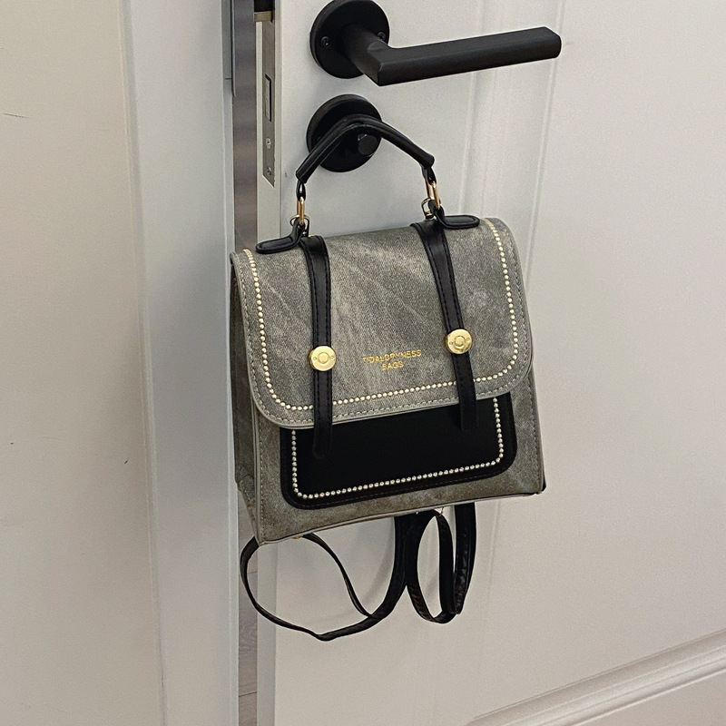 Alta sensación de vaquero pequeño una bolsa de tres mochilas para mujeres 2024 nueva moda mochila de viaje corto