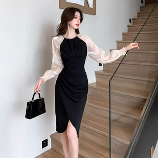 黑色连衣裙女2026春季新款法式心机独特超好看气质通勤长袖裙子