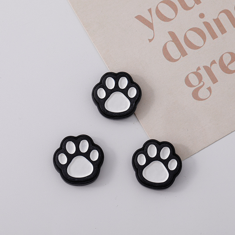 Dibujos animados transfronterizos garra de gato chocolate bricolaje accesorios de resina gel de crema accesorios para el cabello carcasa del teléfono móvil agujeros zapatos parche material