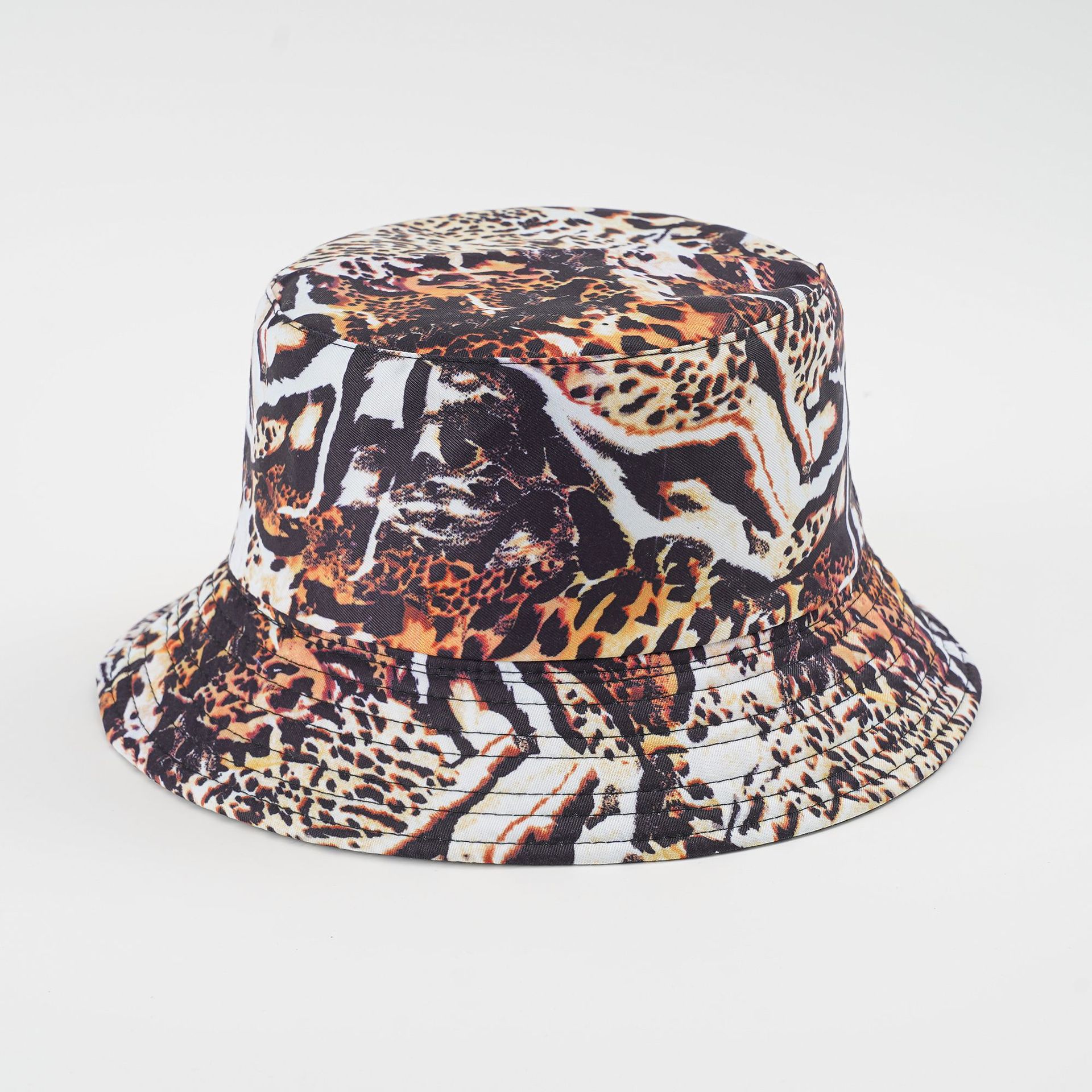 Nueva costura de doble cara sombrero de pescador de estampado de leopardo de moda hombres y mujeres de viaje de primavera y verano sombrero de la cuenca del estilo coreano