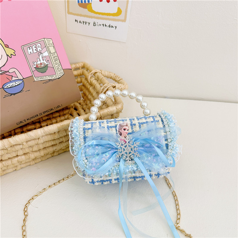 2024 nuevo bolso de moda para niños princesa perla bolso de cambio de mano cadena de chicas bolso de hombro