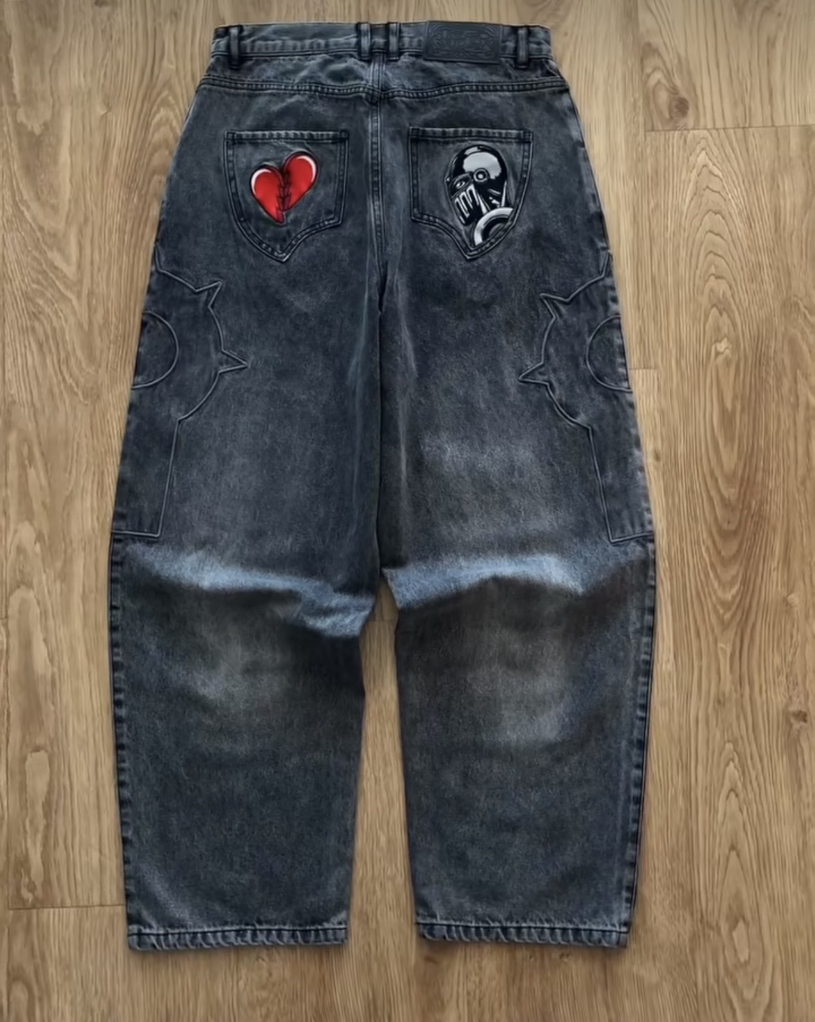 Europa y los Estados Unidos dibujos animados bordados transfronterizos jeans masculinos y femeninos Harajuku retro hacer viejos pantalones de tendencia universal