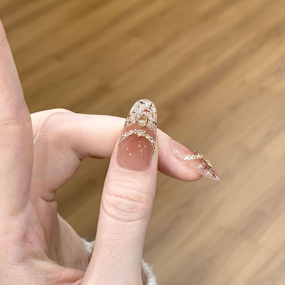 Pequeño libro rojo brillante desgaste de uñas manuales de diamante de manicure ligera de lujo manicure falsa fábrica de uñas al por mayor