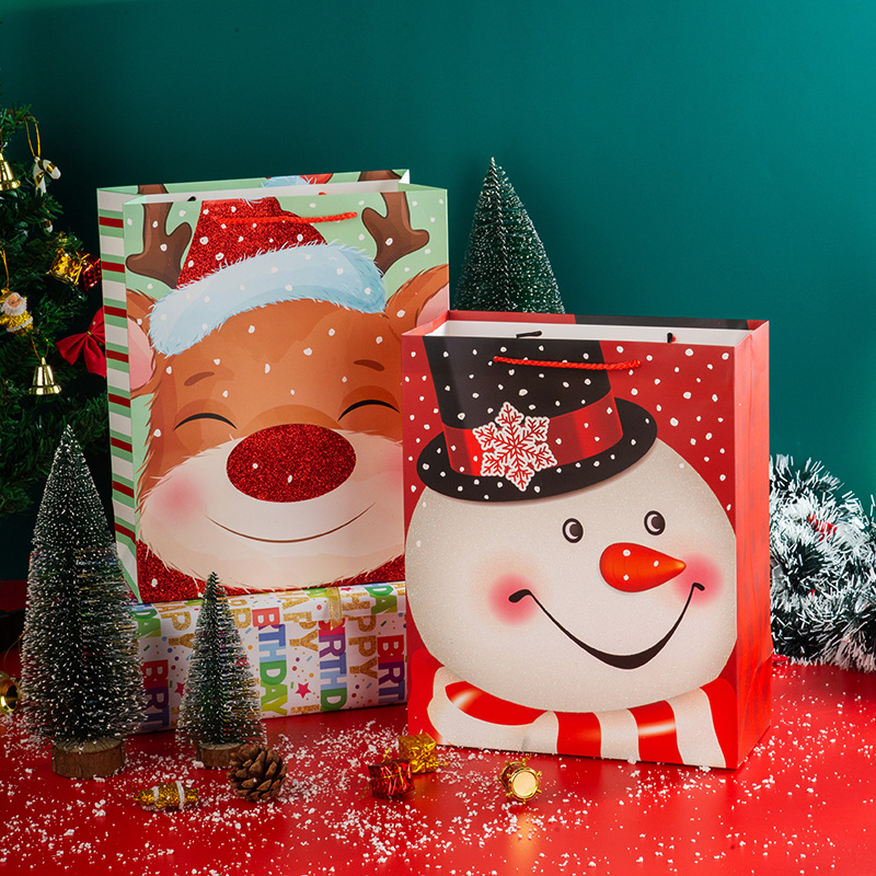 Navidad suelta Rosa dibujos animados muñeco de nieve Navidad ciervos Navidad Eve caja de regalo bolsa de regalo extra grande bolsa de papel portátil