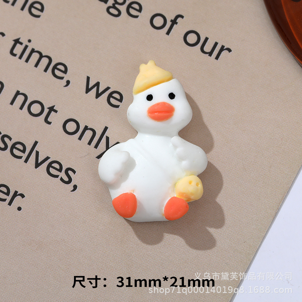 Sombrero de paja al por mayor de pato de celebridad de Internet de dibujos animados de cabeza torcida DIY accesorios de resina teléfono móvil Shell accesorios para el cabello agujero hebilla de zapato